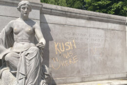 Graffiti on a sculpture at Meridian Hill Park (WTOP/John Domen)