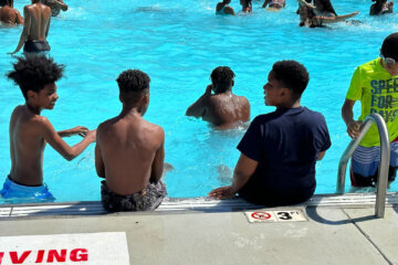 Kids playing in the Randall Pool at the beginning of pool season in D.C. (WTOP/Matt Kaufax)