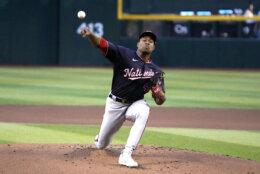 Washington Nationals pitcher Josiah Gray throws against the Arizona Diamondbacks in the first inning during a baseball game, Friday, May 5, 2023, in Phoenix. (AP Photo/Rick Scuteri)