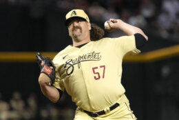Arizona Diamondbacks pitcher Andrew Chafin throws against the Washington Nationals in the ninth inning during a baseball game, Friday, May 5, 2023, in Phoenix. (AP Photo/Rick Scuteri)