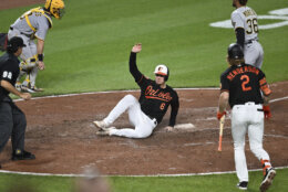 Cedric Mullins swipes third base, 08/12/2023