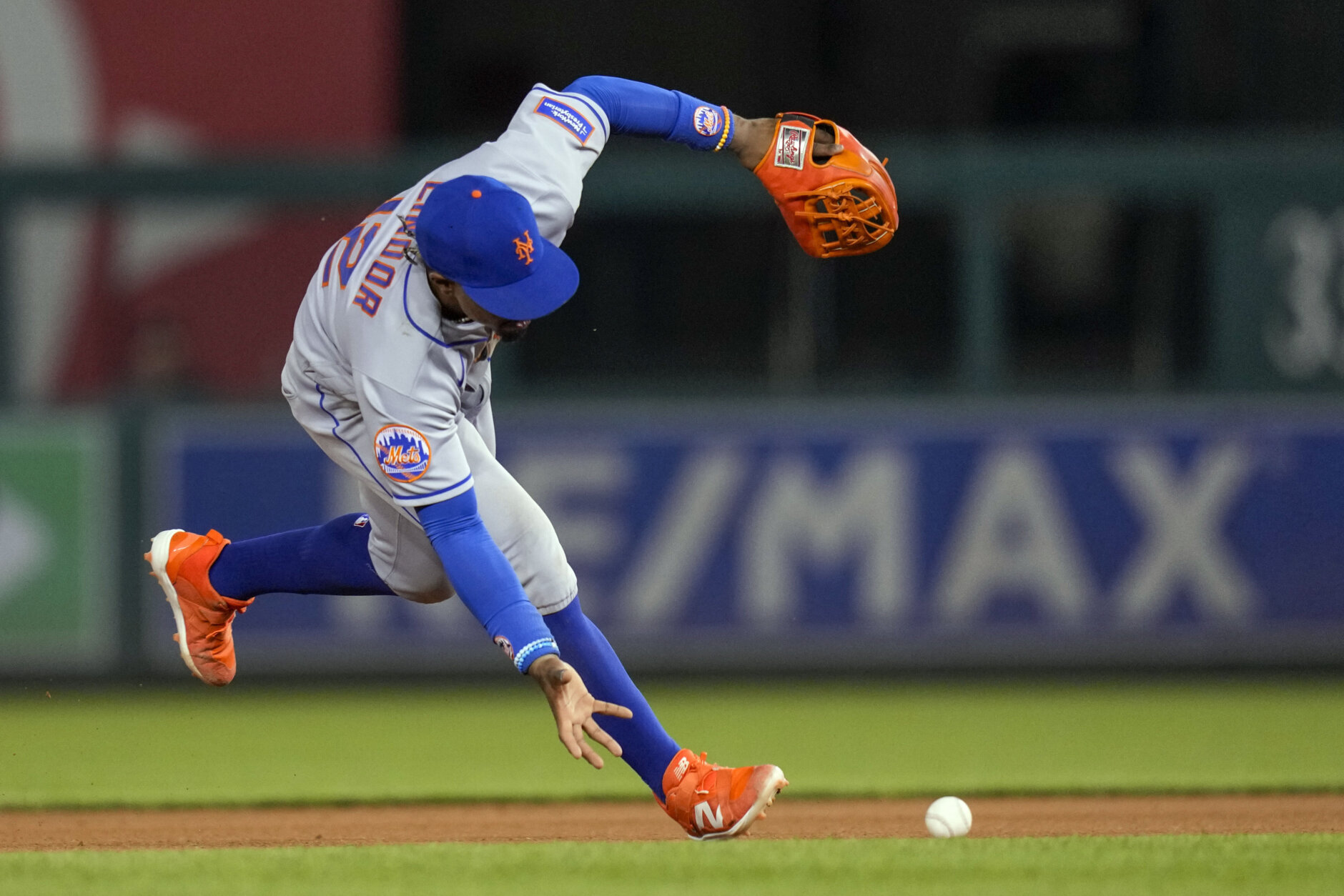 New York Mets shortstop Francisco Lindor fields a ball bare-handed before throwing to first base for the out on Washington Nationals' Keibert Ruiz during the eighth inning of a baseball game at Nationals Park, Friday, May 12, 2023, in Washington. The Mets won 3-2. (AP Photo/Alex Brandon)