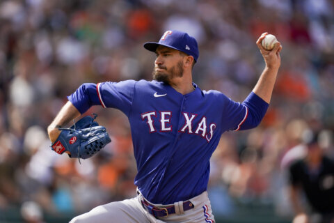 Heaney pitches 7 solid innings to help streaking Rangers beat Orioles 5-3