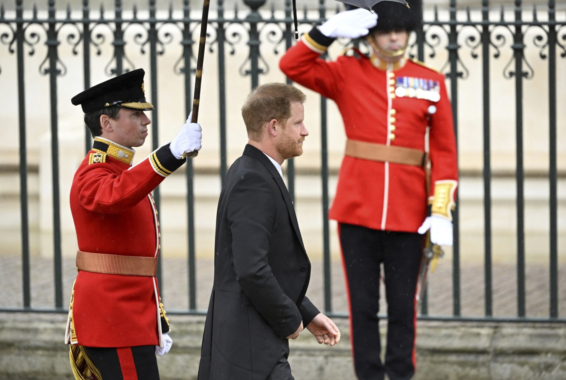 The Queen: People think King Charles' security officer has a gun disguised  as an umbrella