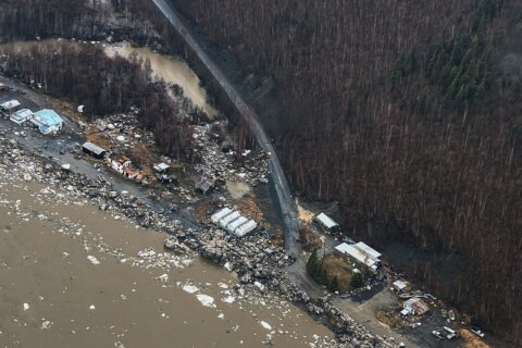 Surging Alaska rivers leave behind huge chunks of ice, damaged homes