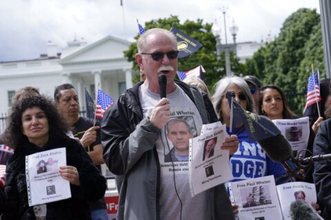 Relatives of Americans held abroad seek action from Biden