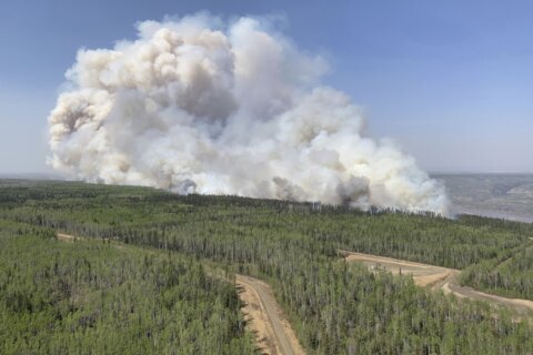 Out-of-control wildfires cause evacuations in western Canada