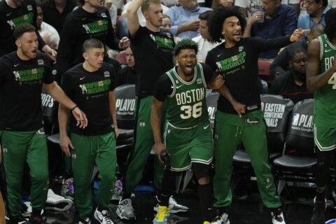 Tatum scores 33, Celtics stave off elimination by topping Heat 116-99 in Game 4