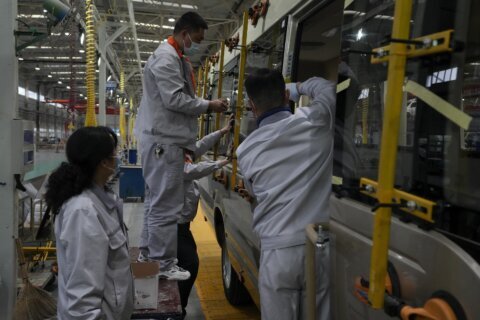 China factory activity slows, adding to economic strains