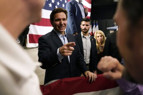 DeSantis plays up his personal side and swipes at Trump in campaign blitz across Iowa
