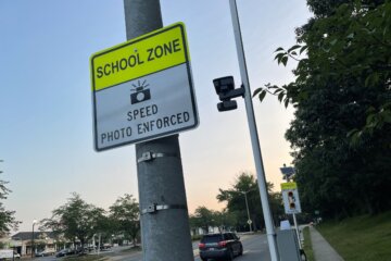 Sign for school zone speed camera.