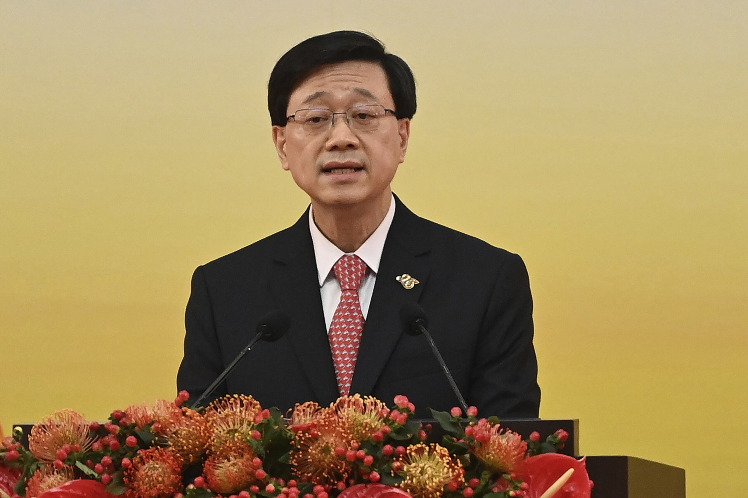 Hong Kong leader defends removing politically sensitive books from ...