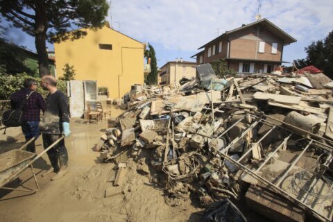 Italy OKs aid mega-package for flooded north, with museum ticket surcharge to help pay for it