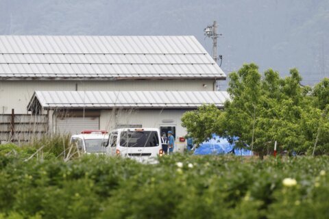 Suspect in killing of 4 people, including 2 police officers, in Japan captured after standoff