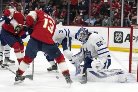 Woll stops 24, Maple Leafs avoid elimination by topping Panthers 2-1 in Game 4