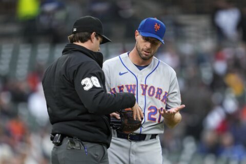 Scherzer hit hard, chased early in return from suspension