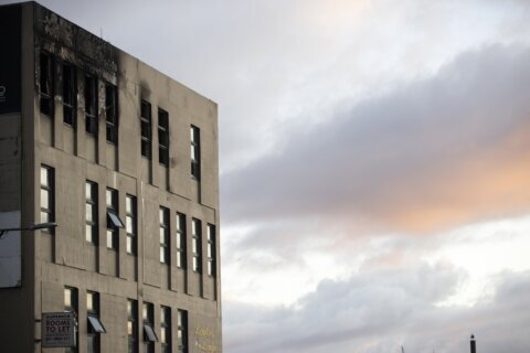 New Zealand police to remove bodies from hostel where at least 6 died in fire