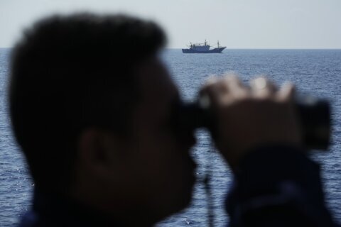 On board a Philippine patrol in contested South China Sea