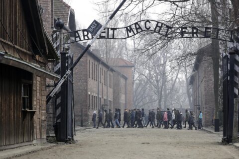 Auschwitz museum criticizes use of death camp in politics after ruling party uses it in political ad