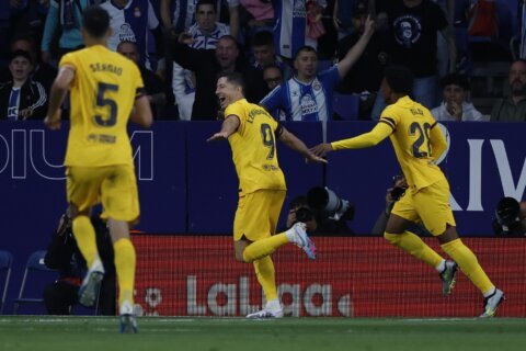 Barcelona, minus Messi, wins Spanish league title for 1st time since 2019