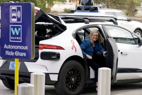 Waymo, Uber set aside past rift over self-driving car technology to team up on robotaxis in Phoenix