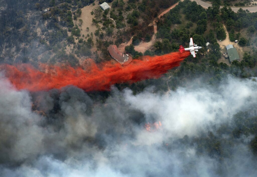 Judge says fire retardant drops are polluting streams but allows use to continue