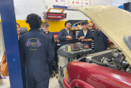 Auto tech students at Lake Braddock Secondary School in Fairfax County got the chance to hone their skills fixing cars abandoned at D.C.-area airports. (WTOP/Kyle Cooper)