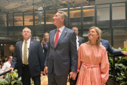 Virginia Gov. Glenn Youngkin helped cut the ribbon at the unveiling of the first phase of the Amazon second headquarters. (WTOP/Shayna Estulin)
