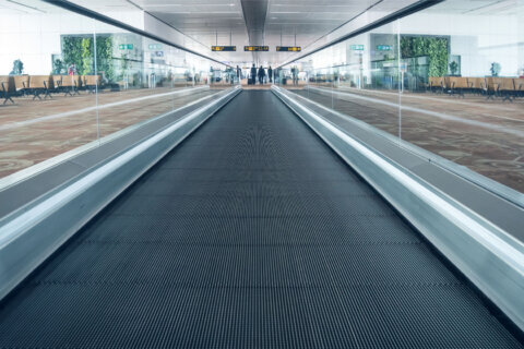 Woman's leg is amputated after being trapped under a moving walkway in a Thai airport