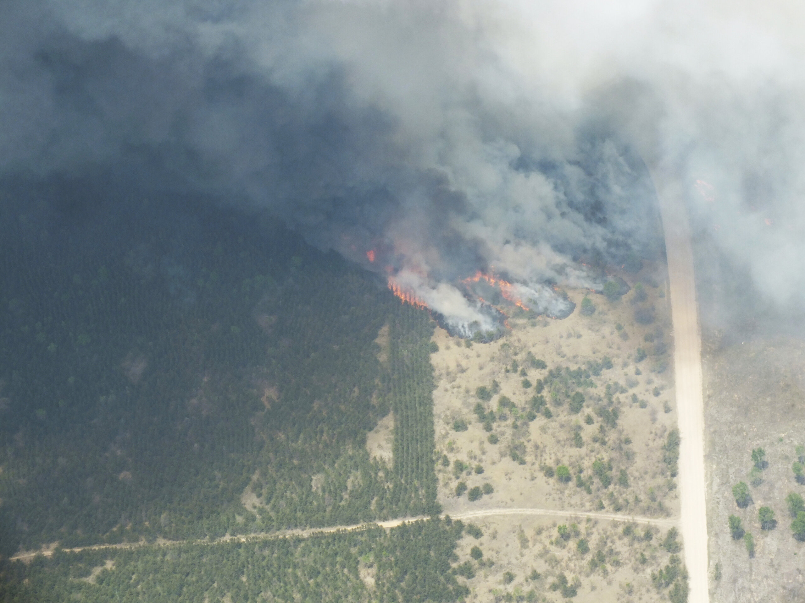 Michigan wildfire that’s burned more than 3 square miles was sparked by