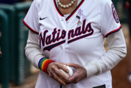 Rep. Nancy Pelosi, D-Calif., prepares to throw out a ceremonial first pitch before a baseball game between the Washington Nationals and the Arizona Diamondbacks at Nationals Park, Tuesday, June 6, 2023, in Washington. The Nationals marked Pride month with their 18th Night OUT event. (AP Photo/Alex Brandon)