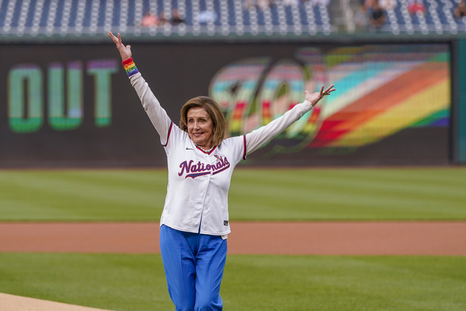 Rep. Nancy Pelosi, D-Calif., reacts after throwing out a ceremonial first pitch before a baseball game between the Washington Nationals and the Arizona Diamondbacks at Nationals Park, Tuesday, June 6, 2023, in Washington. The Nationals celebrated Pride month with their 18th Night OUT event. (AP Photo/Alex Brandon)