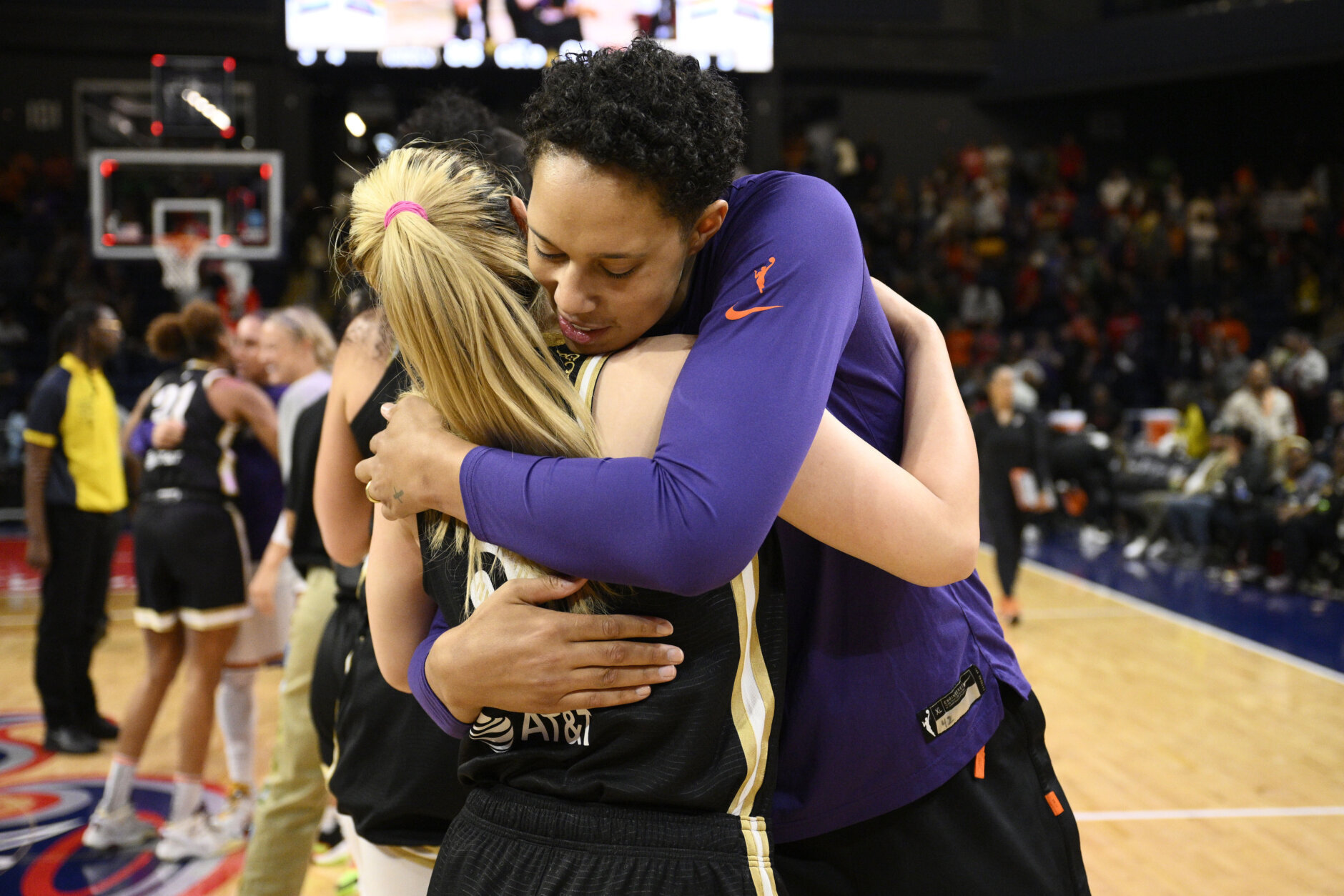 <p>Phoenix Mercury center Brittney Griner, right, hugs Washington Mystics guard Li Meng after a WNBA basketball game Friday, June 16, 2023, in Washington. The Mystics won 88-69. (AP Photo/Nick Wass)</p>
