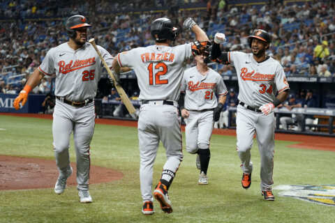 Hicks homers and drives in 4 as the Orioles beat the Rays 8-6 after nearly blowing a 7-run lead
