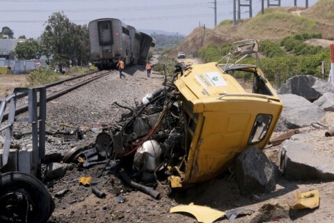 Amtrak train with 198 passengers derails after hitting truck on tracks in Southern California