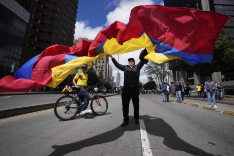 Thousands take to the streets in Colombia to protest leftist government's reforms