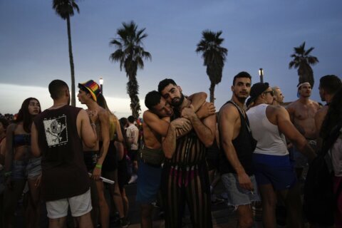 Tens of thousands join Tel Aviv Pride parade, celebrating gains and wary of Israeli government