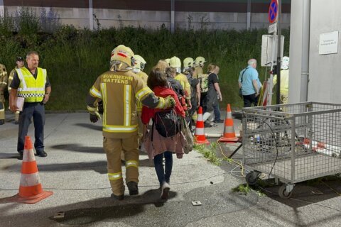 Authorities recover train from Austrian tunnel after fire forces evacuation