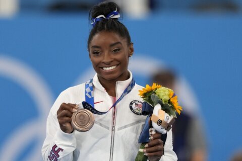 Gymnastics star Simone Biles returning to competition in August in first meet since 2020 Olympics
