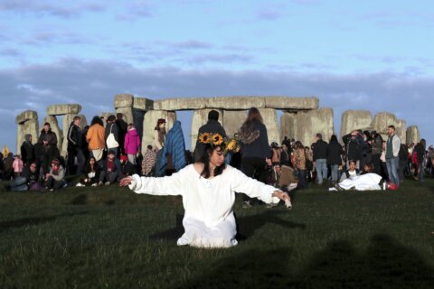 All hail the rising sun! Stonehenge welcomes 8,000 visitors for the summer solstice