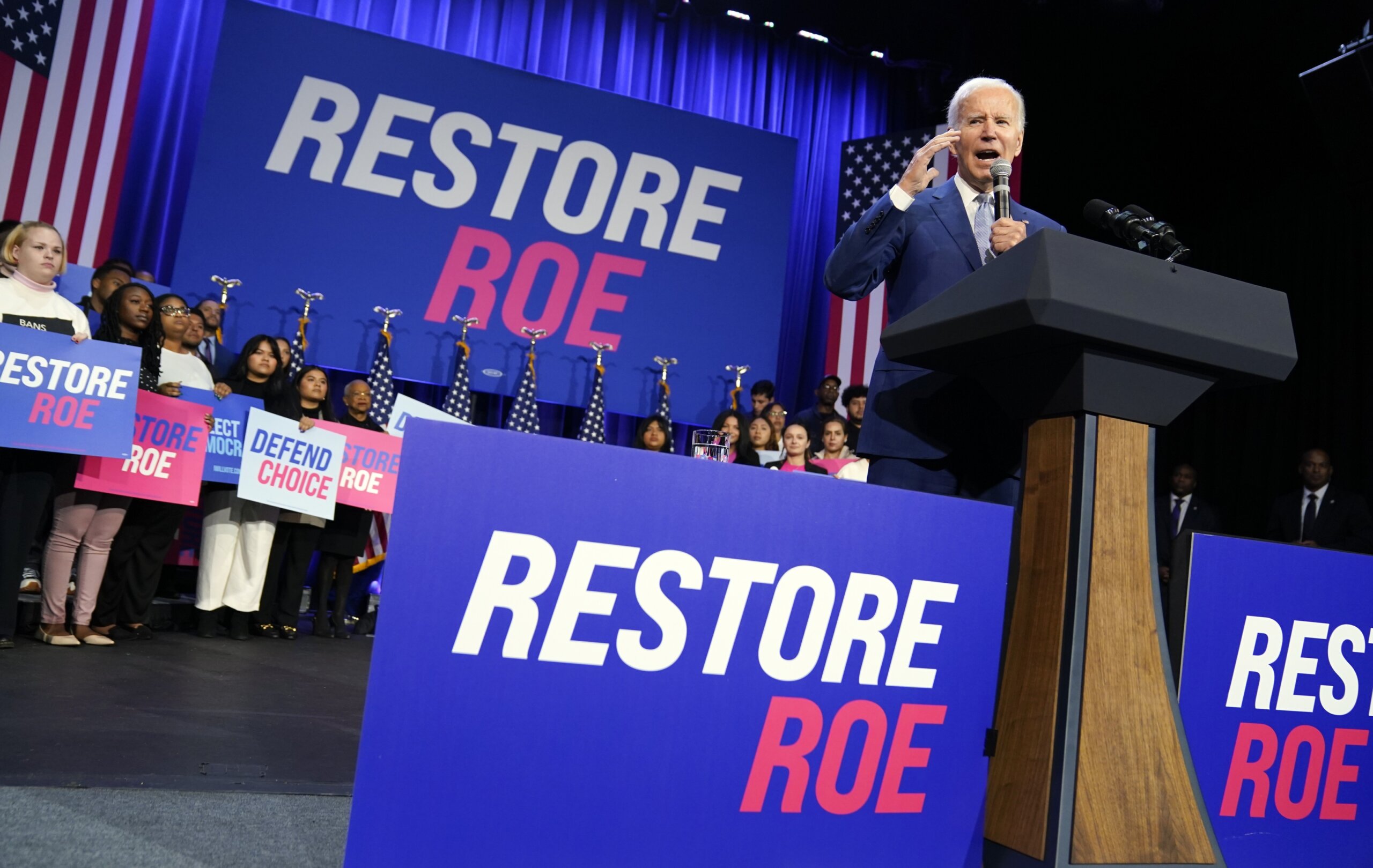 As Biden rallies for abortion rights, conservatives a mile away are