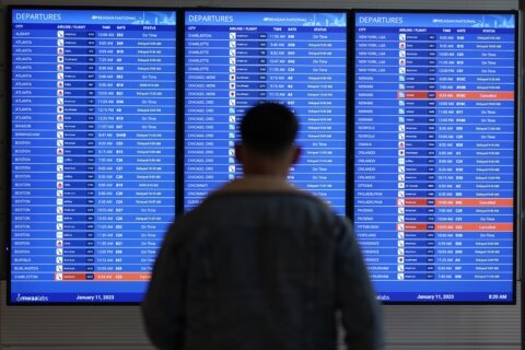 Travelers endure another day of airport agony. One airline has by far the most cancellations