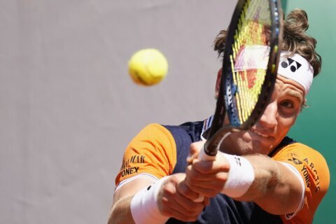 Ruud rallies to beat Zhang at French Open ahead of all-teen showdown