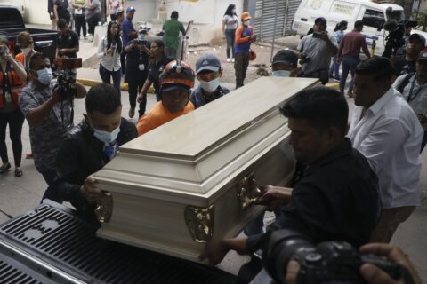 Fear stalks the funerals of victims of Honduras prison massacre