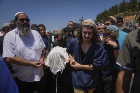 Israeli settlers storm into Palestinian town in West Bank as Israeli airstrike escalates crackdown