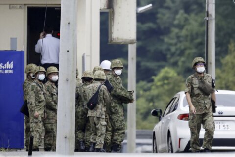 18-year-old trainee accused of shooting 3 soldiers at firing range on Japanese army base, killing 2