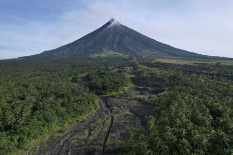 Philippine volcano eruption that displaced thousands may last for months, officials warn