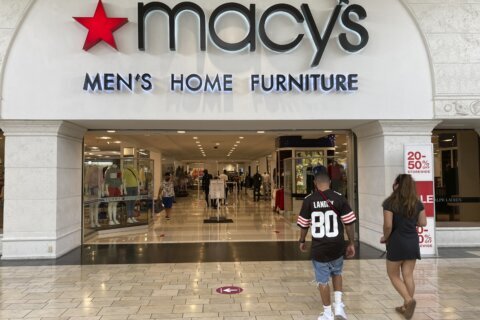 Macy’s slashes expectations for the year after a pullback by shoppers in the spring