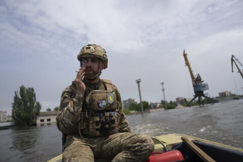 Ukraine recaptures village as Russian forces hold other lines, fire on fleeing civilians elsewhere