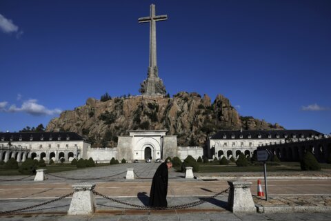 Work begins in Spain to exhume bodies of 128 Franco victims buried anonymously at mausoleum
